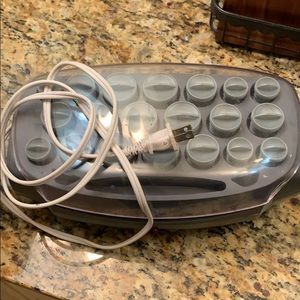 Revlon hot rollers. Works.